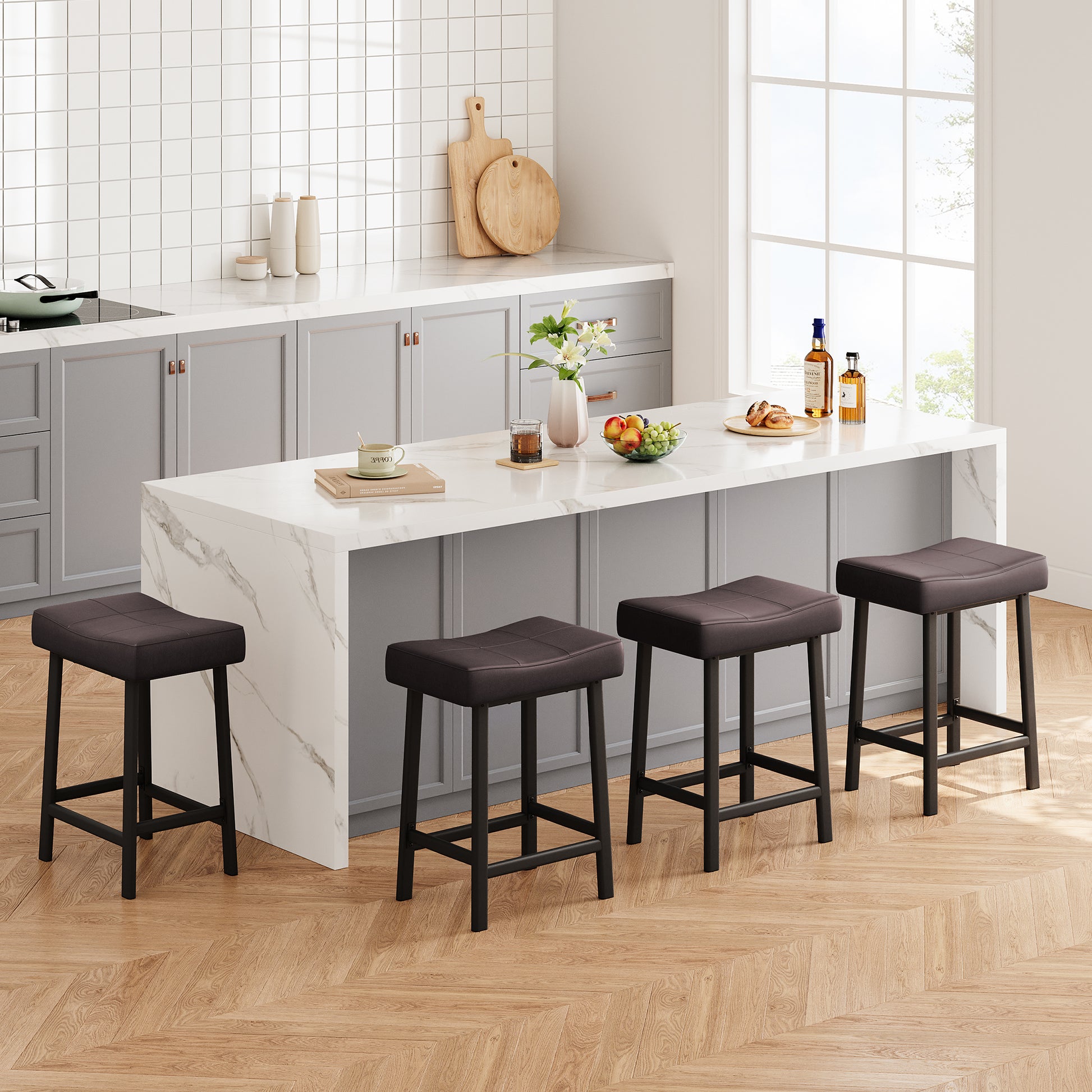 Garvee 24 Inch Backless Saddle Barstools Set of 4, Counter Height Upholstered Padded Barstools with Curved Surface, Metal Leg and Footrest, for Kitchen Counter, Home Bar, Brown
