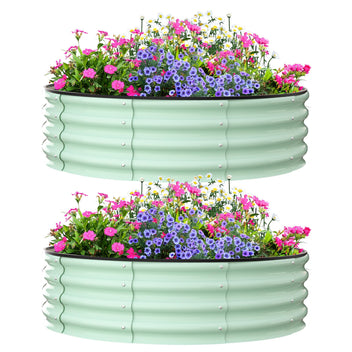 Green raised garden beds, 4ft diameter, durable steel, ideal for outdoor planting.