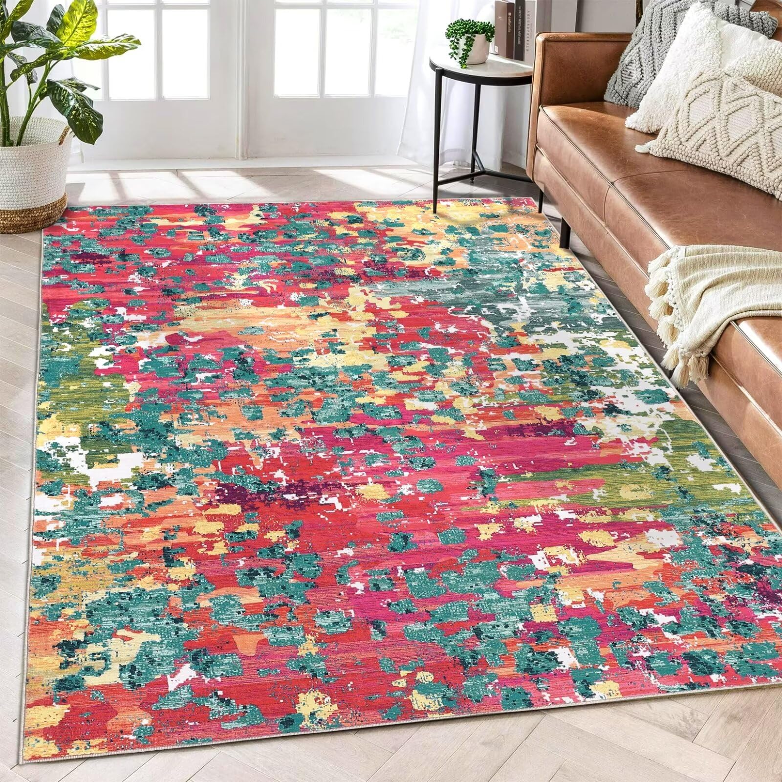 9x12 large rug with easy-care thin texture for modern home decor in vibrant pink and green artistic design
