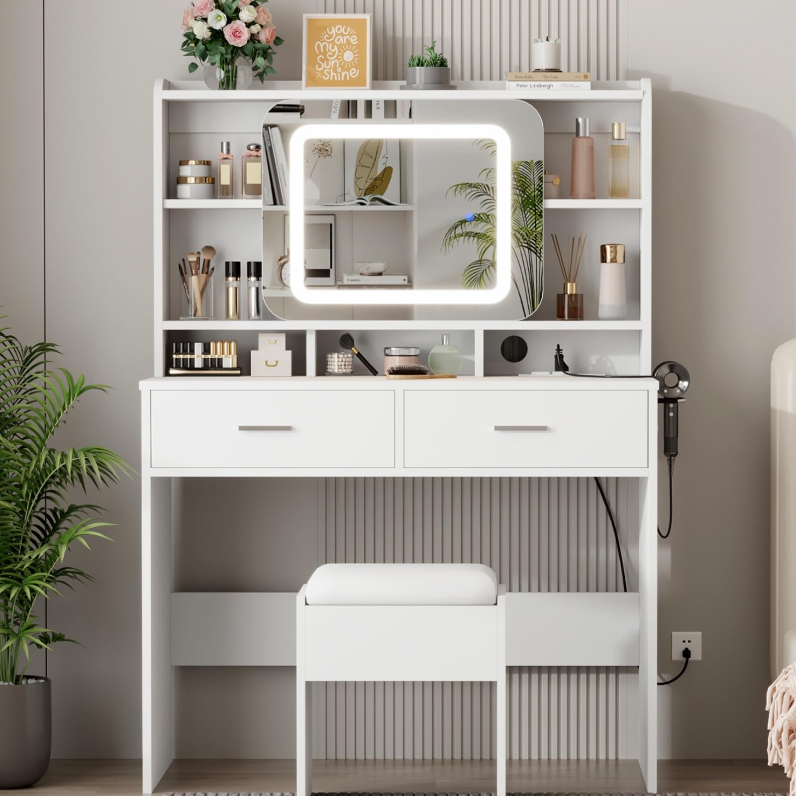 Elegant white vanity desk with LED lighted mirror, drawers, and storage space